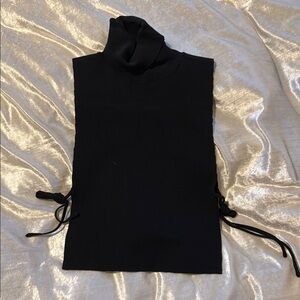 Elegant Black Turtleneck Sweater with Tie Sides